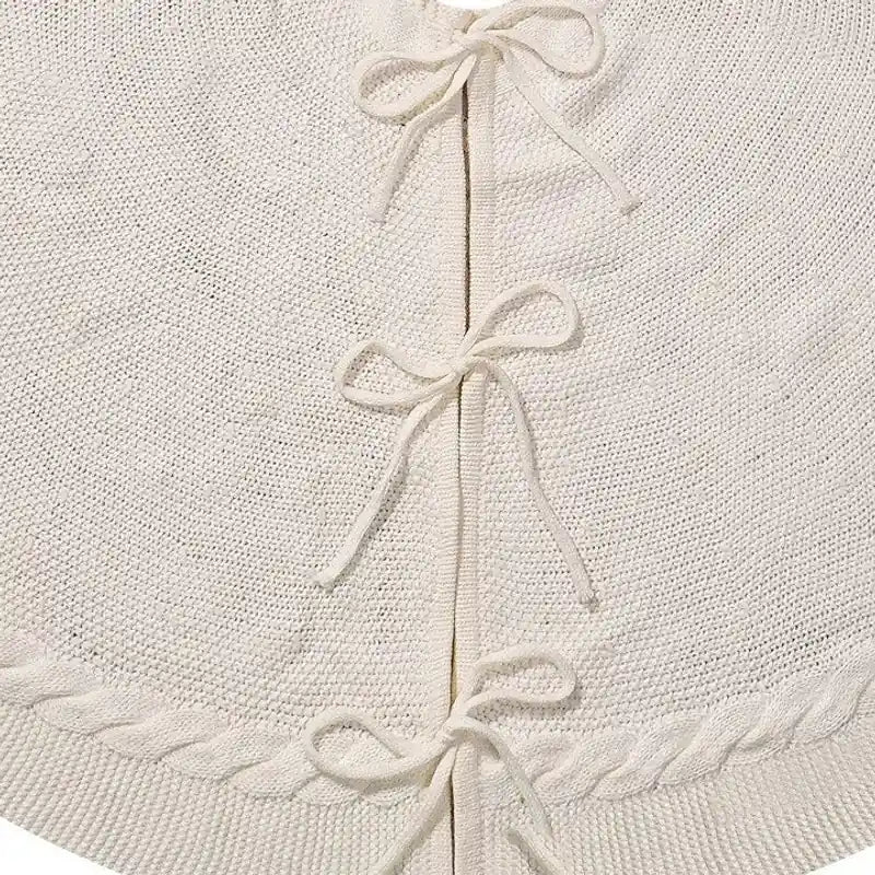Saia para árvore de Natal tricotada branca