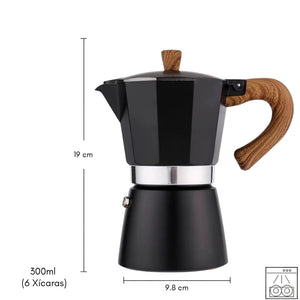 Cafeteira italiana moka preta Torino Lumi Homi sobre bancada, vista frontal
